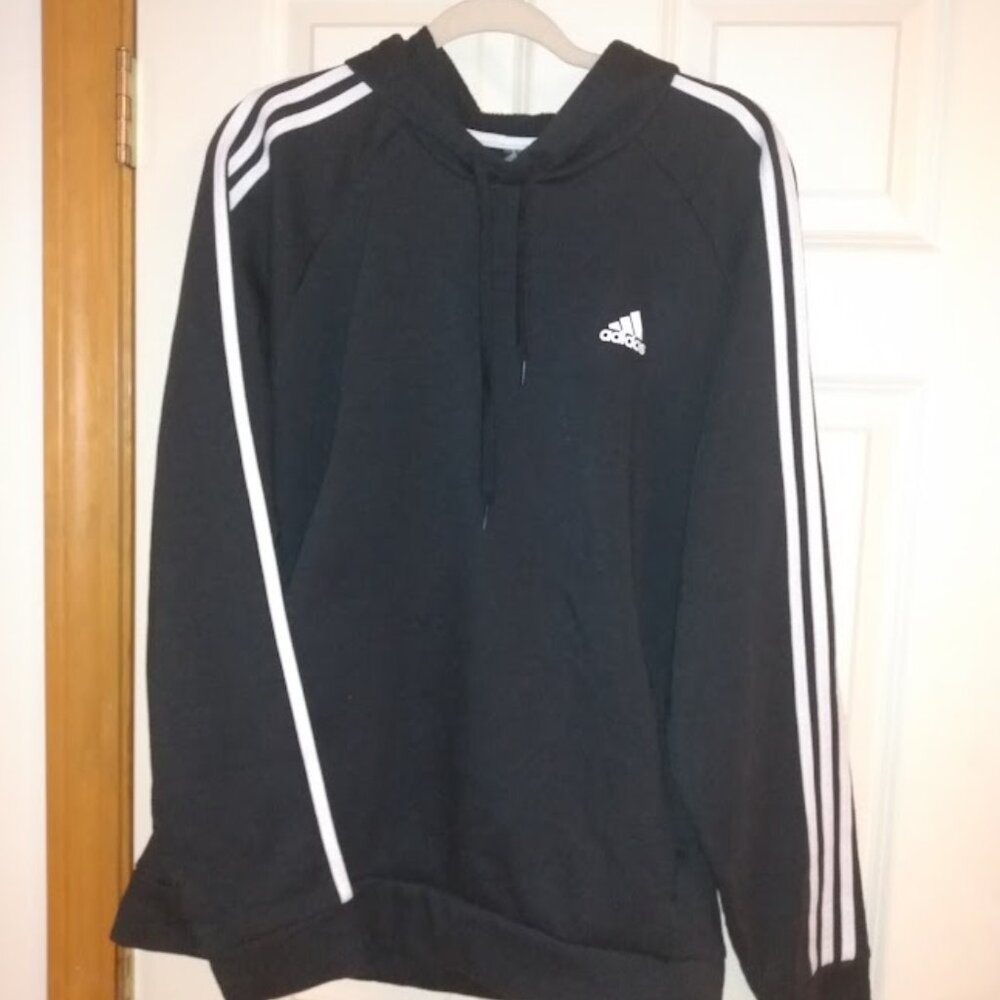 Adidas: hooded man's black sweatshirt with white strips on the sleeves. Size XL.